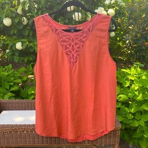 Burnt orange sleeveless top w/ woven neck detail